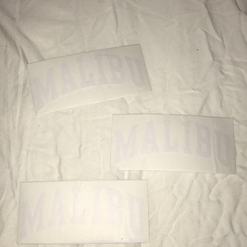 TWO peel off stickers